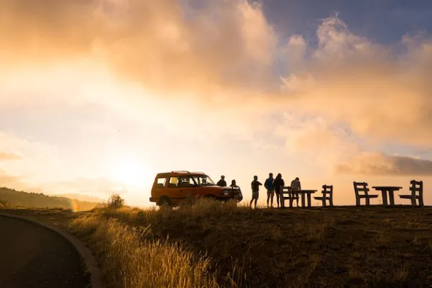 a train traveling down a dirt road