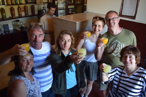 a group of people sitting at a table