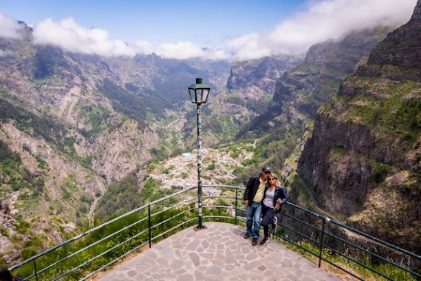 a bridge with a mountain in the background