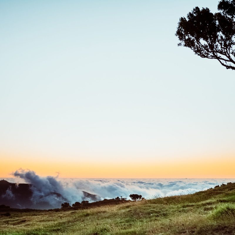 a sunset over a body of water