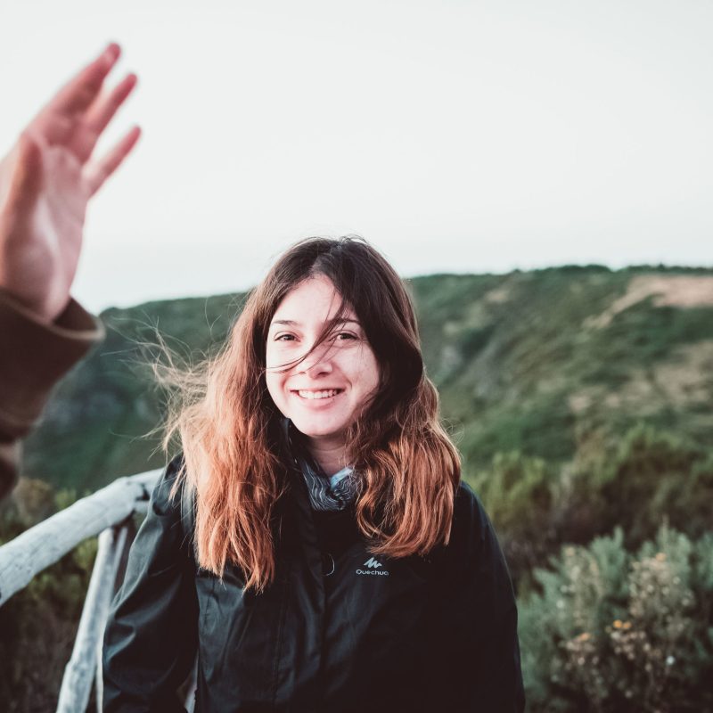 a woman looking at the camera