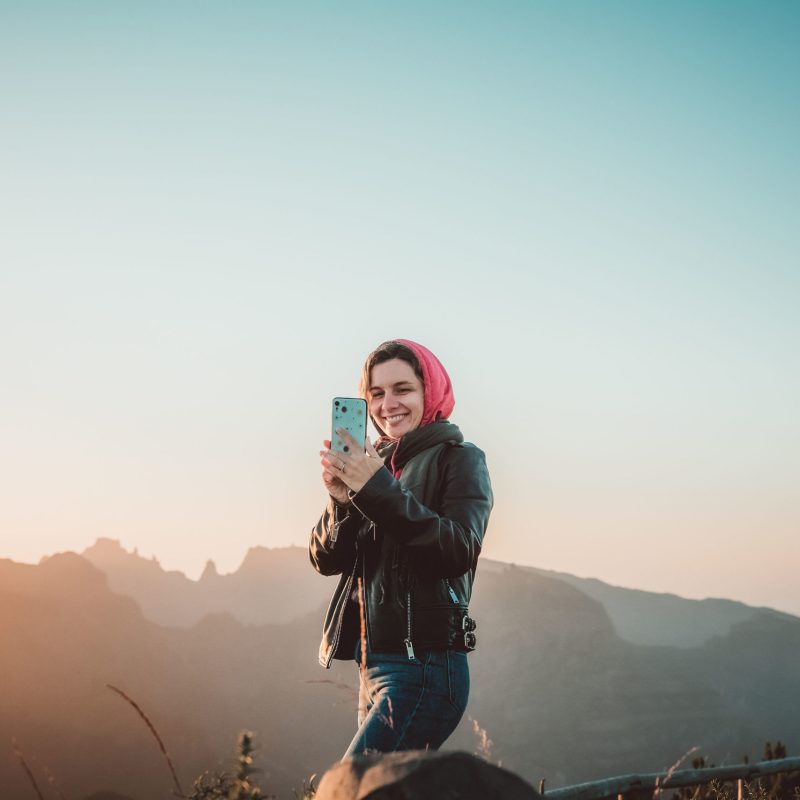 a man standing on top of a mountain