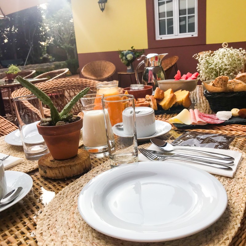 a table topped with plates of food on a plate