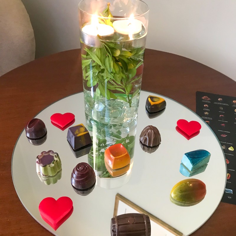 a plate of food and a glass of wine