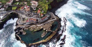 a train cake sitting on top of a rock
